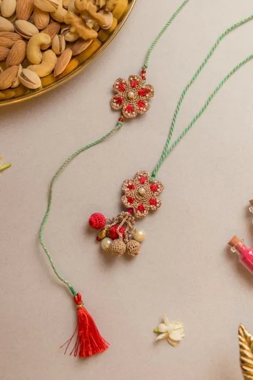 Samoolam Coral Red Crochet Rakhi & Lumba Set (Set Of 2)