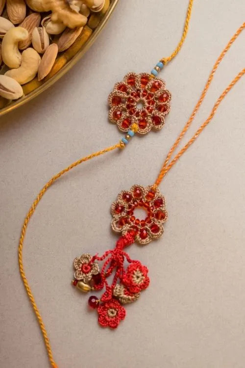 Samoolam Red Stone Crochet Rakhi & Lumba Set (Set Of 2)