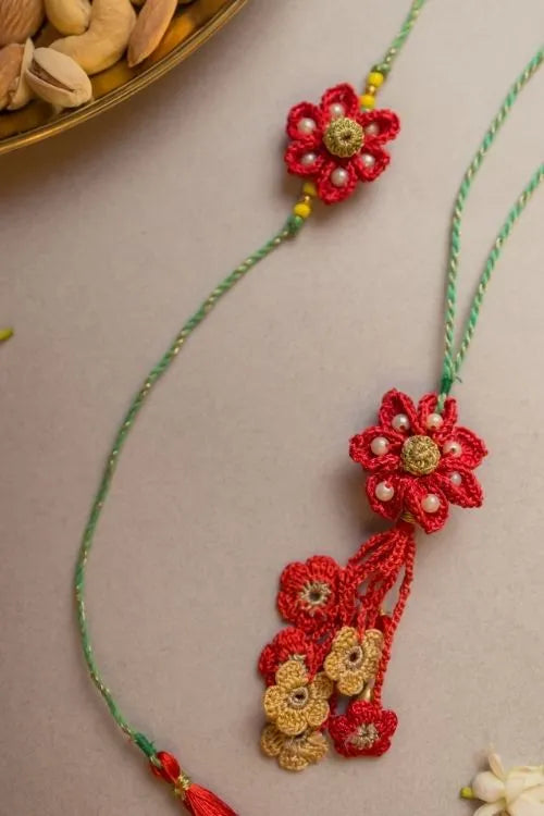 Samoolam Red Flower Crochet Rakhi & Lumba Set (Set Of 2)