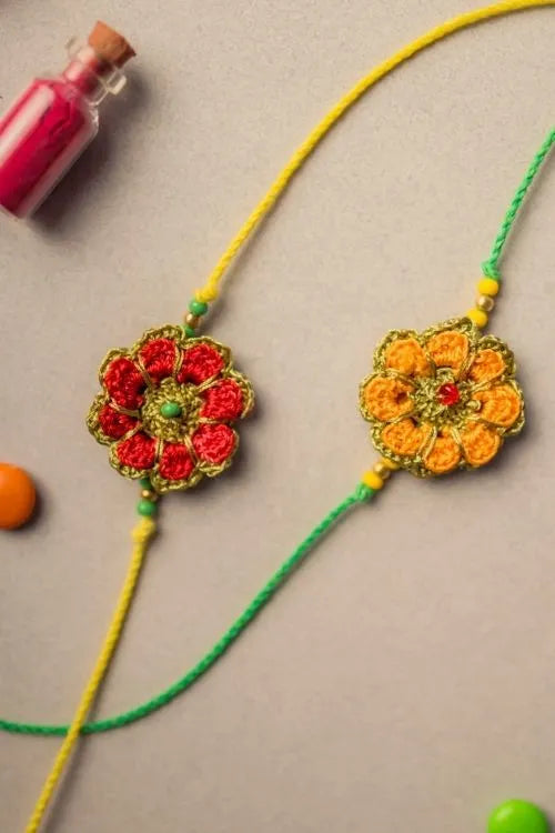 Samoolam Festive Marigold Crochet Rakhi Set (Set Of 2)