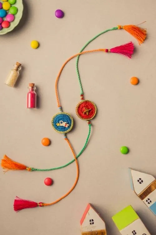 Samoolam Universe Crochet Rakhi Set (Set Of 2)