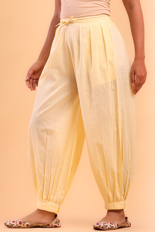 Buy Stylish Orange Printed Cotton Afghani Pants for female