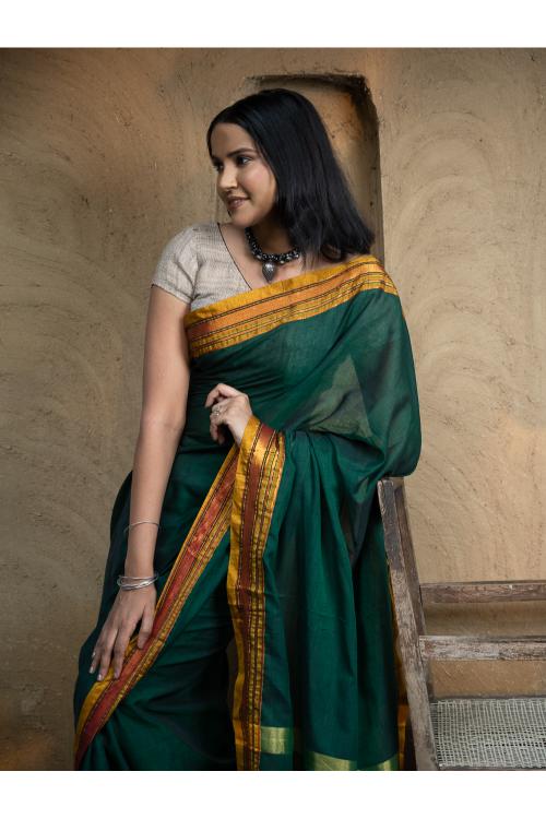 Traditional Dark Green Soft Silk Saree With Hypnotic Blouse