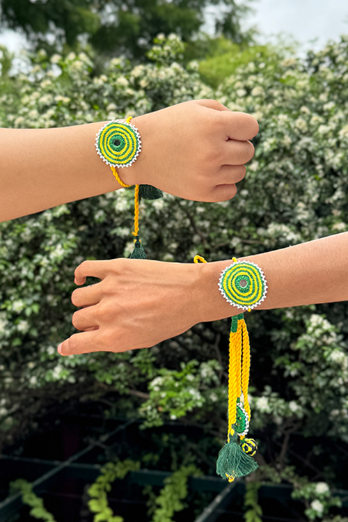 Antarang Yellow Green Bhai-Bhabhi Rakhi Set