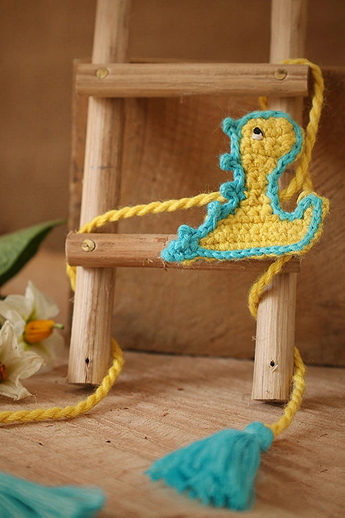 Himalayan Blooms Rakhi With Baby Dragon Toys