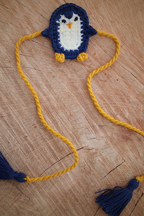 Himalayan Blooms Rakhi With Penguin Toys