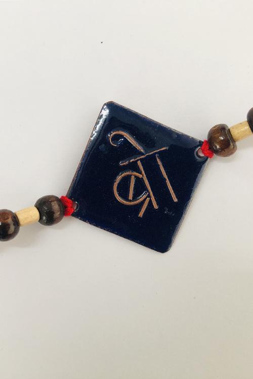 Okhai 'Dulari' Navy Blue Copper Enamel Rakhi