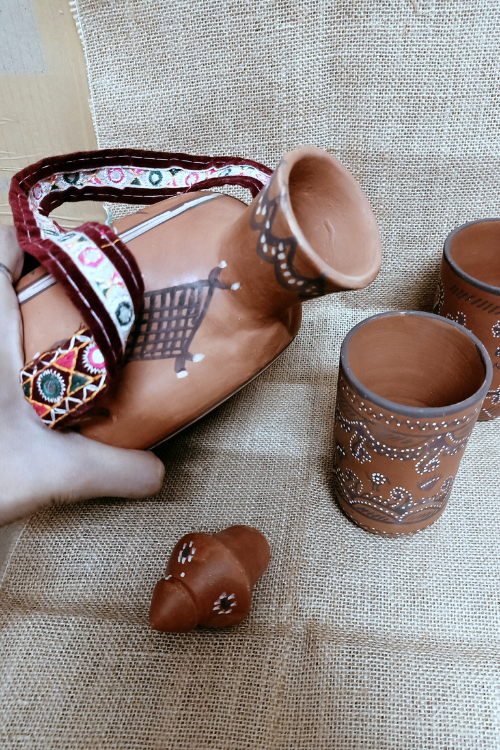 Terracotta by Sachii "Kutch Painted Pottery Donut Bottle and Tumblers Set"