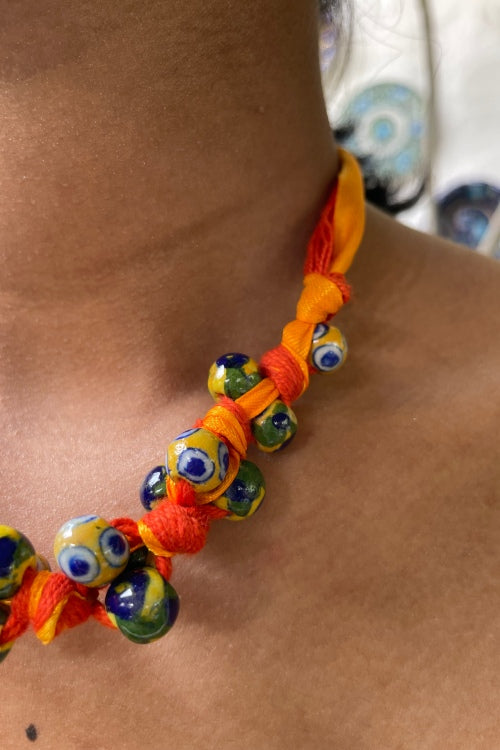 Blue Pottery Handcrafted Orange And Yellow Knot Necklace