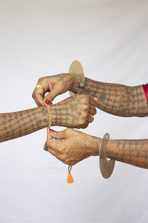 Okhai 'Sarayu' Orange Organic Cotton Thread Rakhi